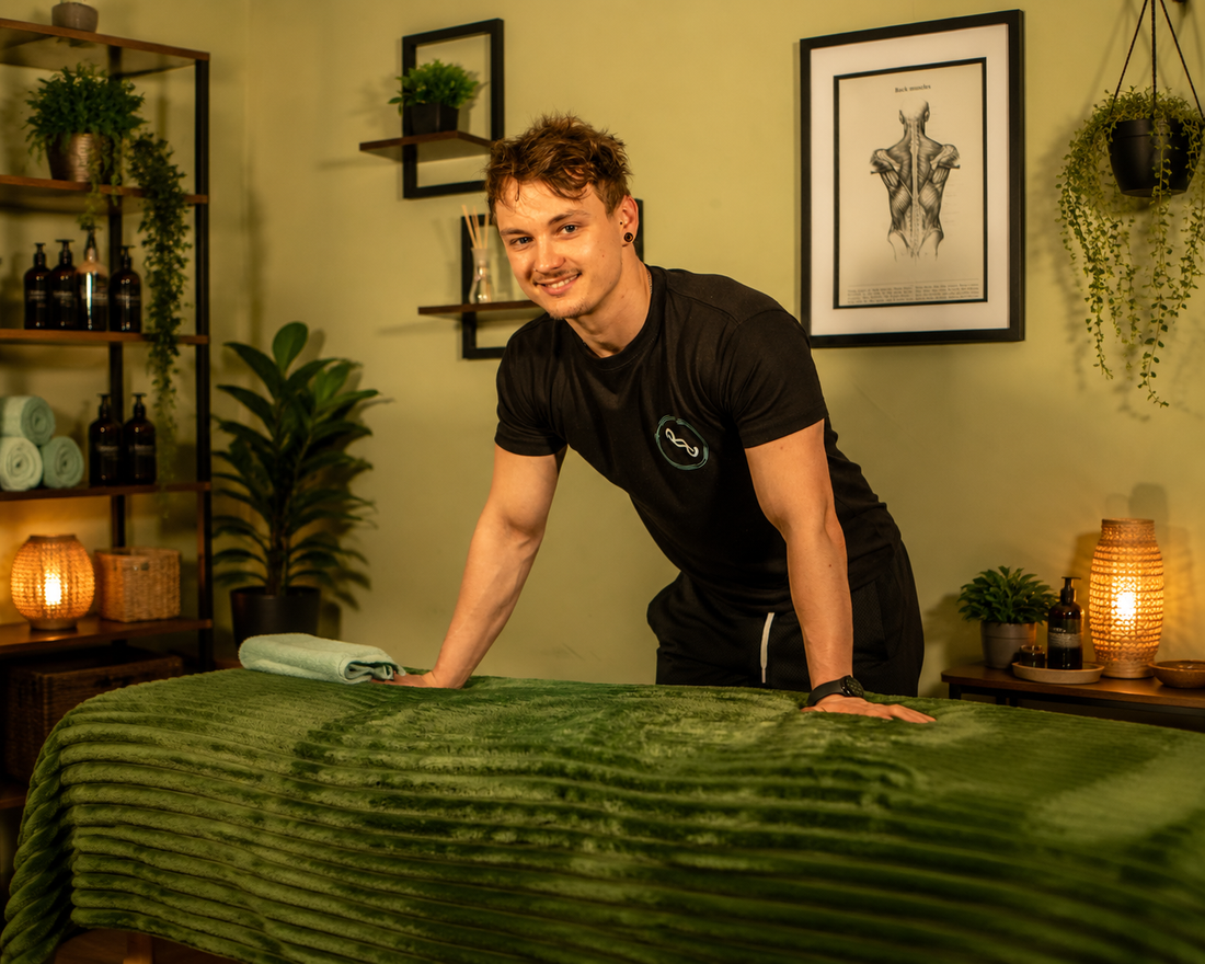 image showing male therapist getting ready for athlete massage. 